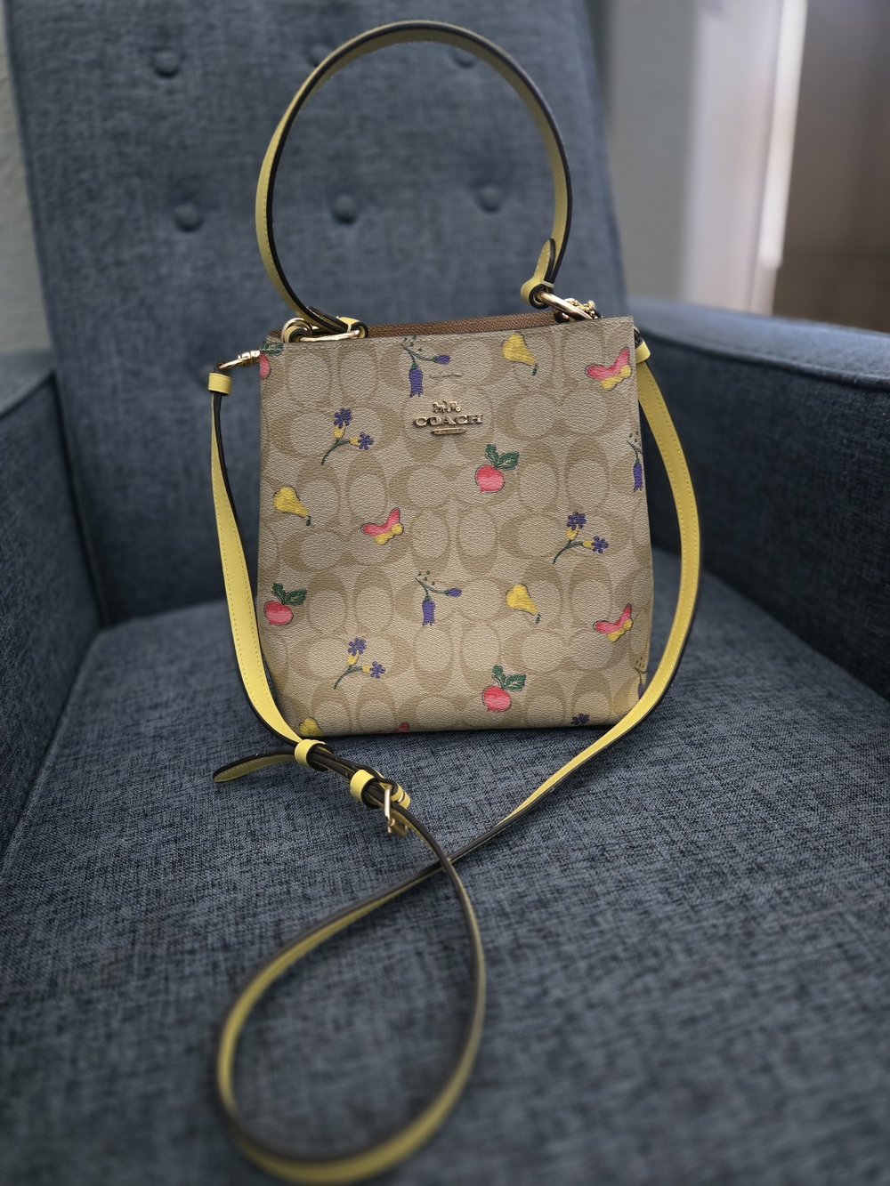Coach Small Town Bucket Bag- Signature Canvas flower print W/ Yellow Trim